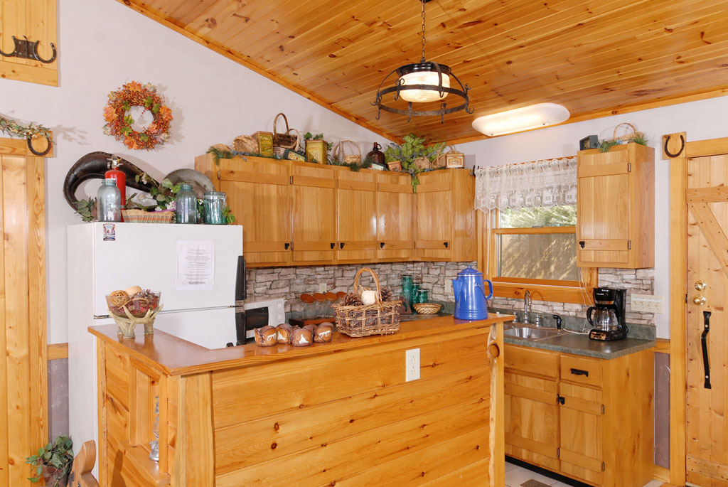 Pigeon Forge Vacation Cabin Rental that features a fully equipped kitchen